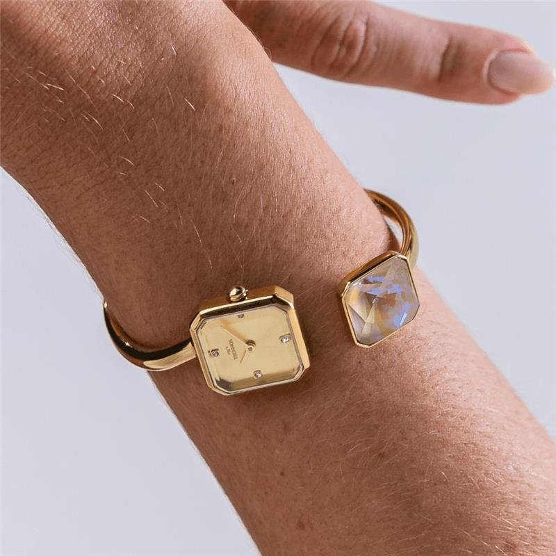 RELOGIO TECHNOS FEMININO CRYSTAL DOURADO AÇO BRACELETE COM CRISTAL SOLITÁRIO DE ORIGEM AUSTRÍACA